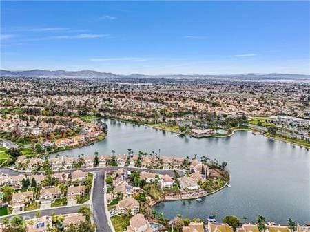 10600 Silverleaf Cir, Moreno Valley, CA 92557 - aerial view of property and surrounding area with nearby suburban area and a water and mountain view