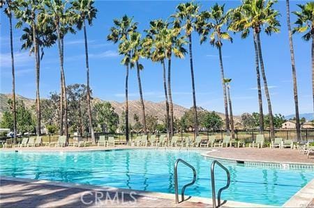 10600 Silverleaf Cir, Moreno Valley, CA 92557 - community pool featuring a mountain view