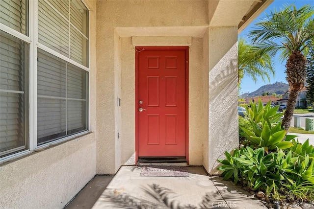 3450 Lake Park Ave, Fallbrook, CA 92028 - doorway to property featuring stucco siding and a mountain view