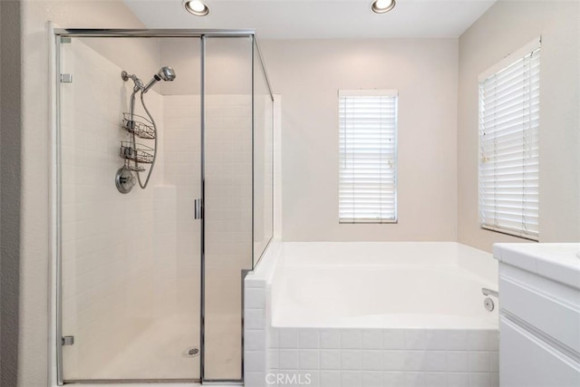 3450 Lake Park Ave, Fallbrook, CA 92028 - full bath with a shower stall, a garden tub, vanity, and recessed lighting