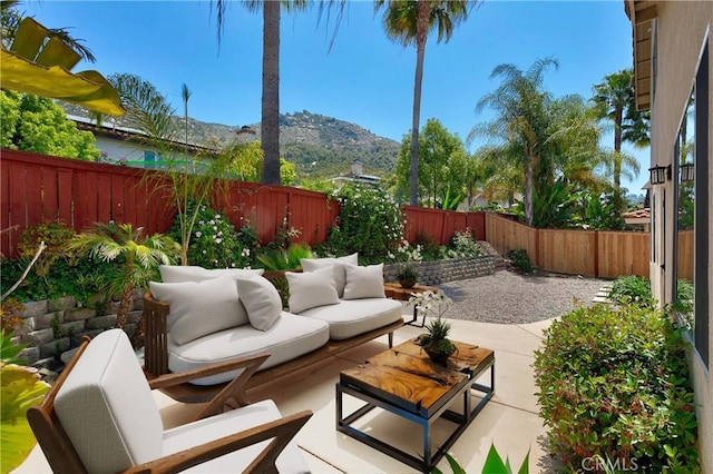 3450 Lake Park Ave, Fallbrook, CA 92028 - fenced backyard with a patio area, outdoor lounge area, and a mountain view