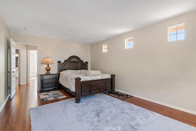 3450 Lake Park Ave, Fallbrook, CA 92028 - bedroom with multiple windows and wood finished floors