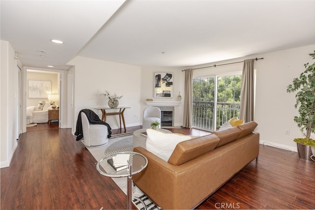 530 W Stocker St Unit 205, Glendale, CA 91202 - living area featuring dark wood-type flooring, a glass covered fireplace, and recessed lighting