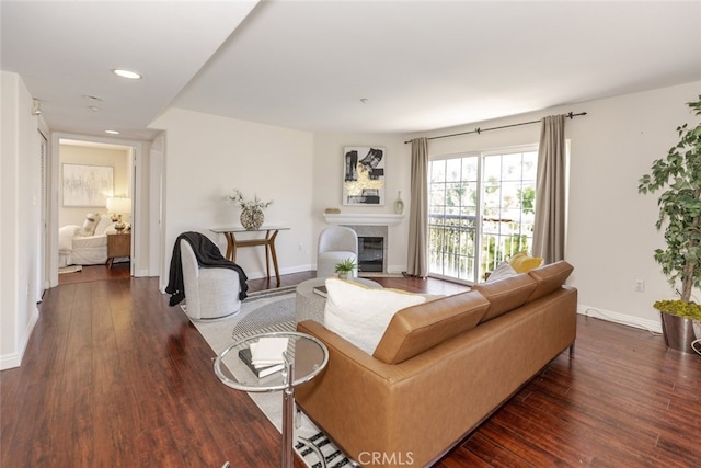 530 W Stocker St Unit 205, Glendale, CA 91202 - living area with dark wood finished floors, a glass covered fireplace, and recessed lighting