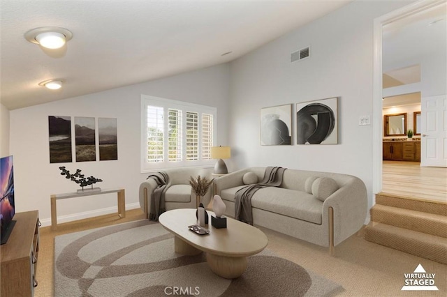 23609 Wilmington Ct, Valencia, CA 91354 - carpeted living room with vaulted ceiling