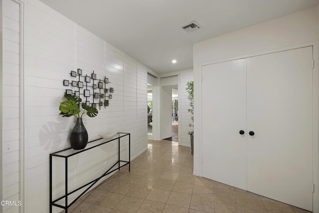 3505 E California Blvd, Pasadena, CA 91107 - hallway featuring tile walls, light tile patterned flooring, and recessed lighting
