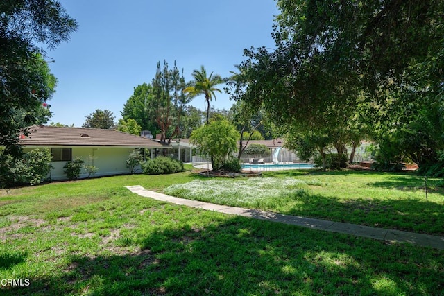3505 E California Blvd, Pasadena, CA 91107 - view of grassy yard with an outdoor pool