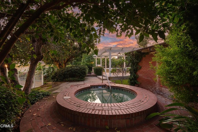 3505 E California Blvd, Pasadena, CA 91107 - pool at dusk with an in-ground hot tub and a pergola
