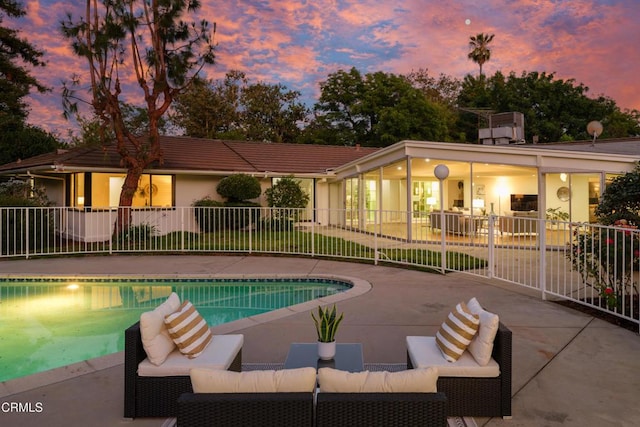 3505 E California Blvd, Pasadena, CA 91107 - pool at dusk featuring a patio area and an outdoor hangout area