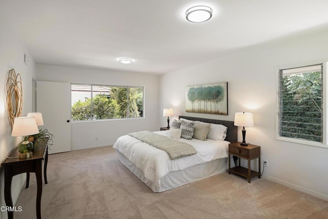 3505 E California Blvd, Pasadena, CA 91107 - bedroom with light colored carpet and multiple windows