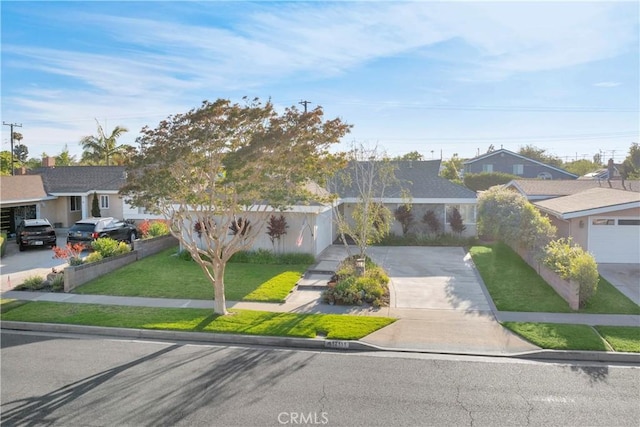 12111 Reagan St, Los Alamitos, CA 90720 - ranch-style home featuring concrete driveway and a residential view