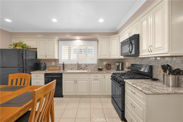 12111 Reagan St, Los Alamitos, CA 90720 - kitchen with black appliances, light tile patterned floors, ornamental molding, backsplash, and light stone counters