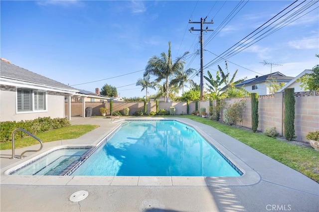 12111 Reagan St, Los Alamitos, CA 90720 - view of pool featuring a fenced backyard, a pool with connected hot tub, and a patio