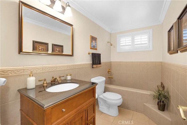 12111 Reagan St, Los Alamitos, CA 90720 - full bathroom featuring tile walls, tile patterned floors, a bathtub, vanity, and wainscoting