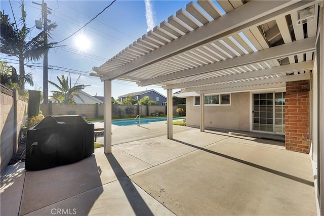 12111 Reagan St, Los Alamitos, CA 90720 - fenced backyard featuring area for grilling, a pergola, and a patio area