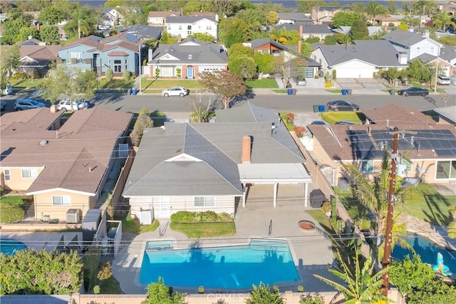 12111 Reagan St, Los Alamitos, CA 90720 - aerial perspective of suburban area featuring a pool
