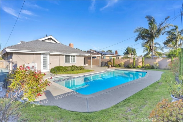 12111 Reagan St, Los Alamitos, CA 90720 - view of swimming pool with a fenced backyard and a pool with connected hot tub