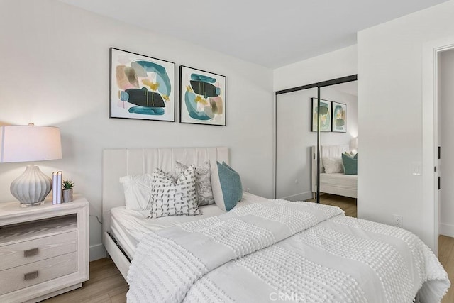 23631 Via Storni, Mission Viejo, CA 92692 - bedroom featuring wood finished floors and a closet
