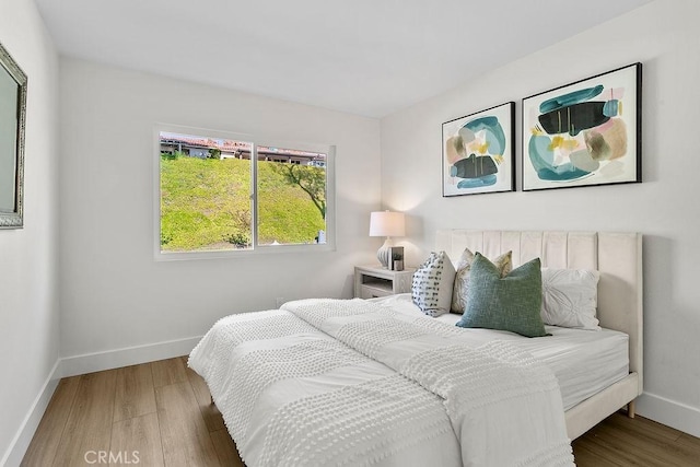 23631 Via Storni, Mission Viejo, CA 92692 - bedroom with baseboards and wood finished floors