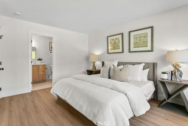 23631 Via Storni, Mission Viejo, CA 92692 - bedroom with light wood-type flooring and connected bathroom