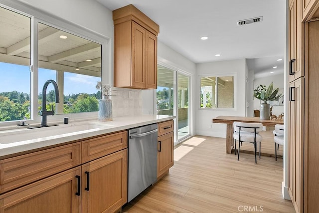 23631 Via Storni, Mission Viejo, CA 92692 - kitchen with light wood-type flooring, dishwasher, recessed lighting, and tasteful backsplash