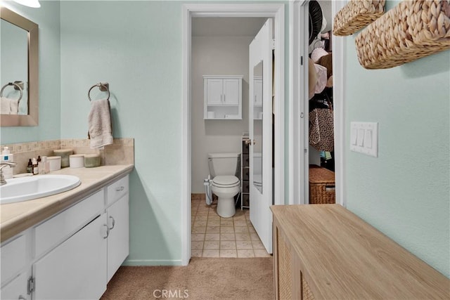 139 Flag Way Unit C, Paso Robles, CA 93446 - bathroom featuring vanity, tasteful backsplash, and tile patterned flooring