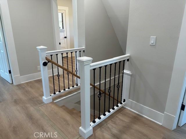 1902 E Citrus Ave, Redlands, CA 92374 - stairs with wood finished floors and baseboards