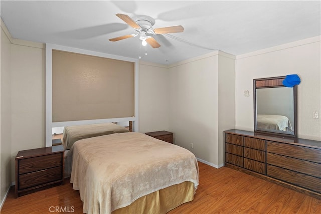 932 Redwood Ct, Corona, CA 92879 - bedroom featuring wood finished floors and a ceiling fan