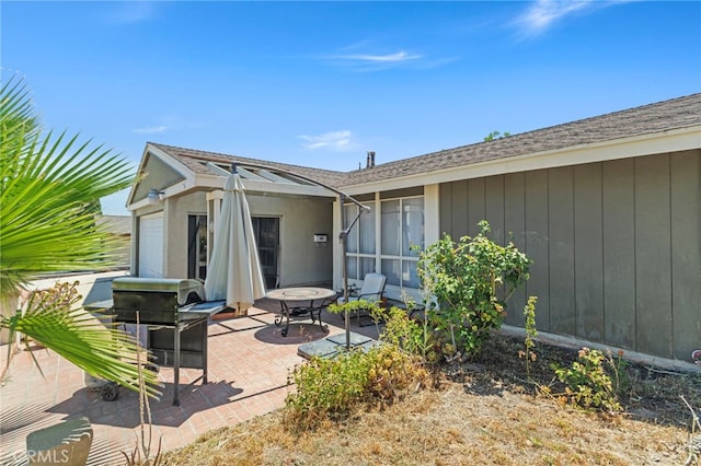 932 Redwood Ct, Corona, CA 92879 - rear view of property featuring a patio area and a shingled roof