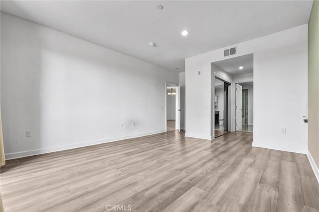 991 Arapahoe St Unit 202A, Los Angeles, CA 90006 - empty room with light wood-style flooring and recessed lighting