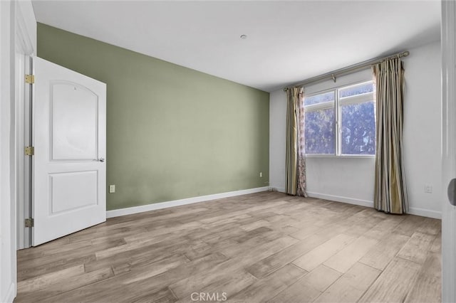 991 Arapahoe St Unit 202A, Los Angeles, CA 90006 - spare room with wood finished floors and baseboards