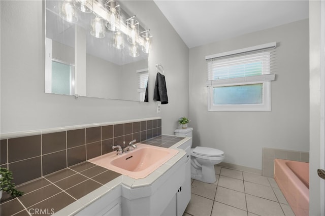 10802 Jordan Rd, Whittier, CA 90603 - full bath featuring a bathtub, vanity, tasteful backsplash, and tile patterned floors