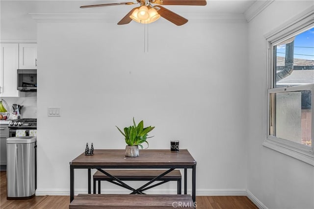 7503 Norwalk Blvd, Whittier, CA 90606 - detailed view of stainless steel appliances, wood finished floors, ceiling fan, and ornamental molding