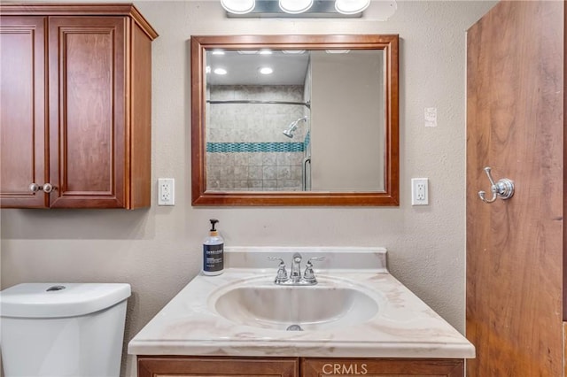 7503 Norwalk Blvd, Whittier, CA 90606 - full bath featuring vanity, a textured wall, and tiled shower