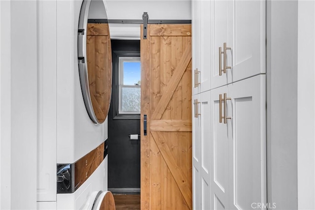 7503 Norwalk Blvd, Whittier, CA 90606 - doorway to outside featuring a barn door and stacked washer / drying machine