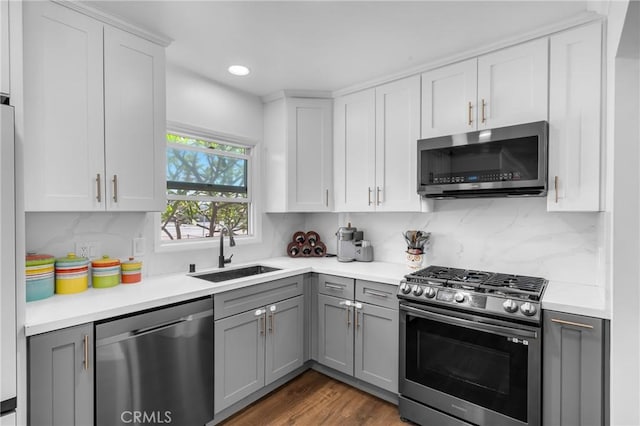 7503 Norwalk Blvd, Whittier, CA 90606 - kitchen with appliances with stainless steel finishes, gray cabinetry, light countertops, and recessed lighting