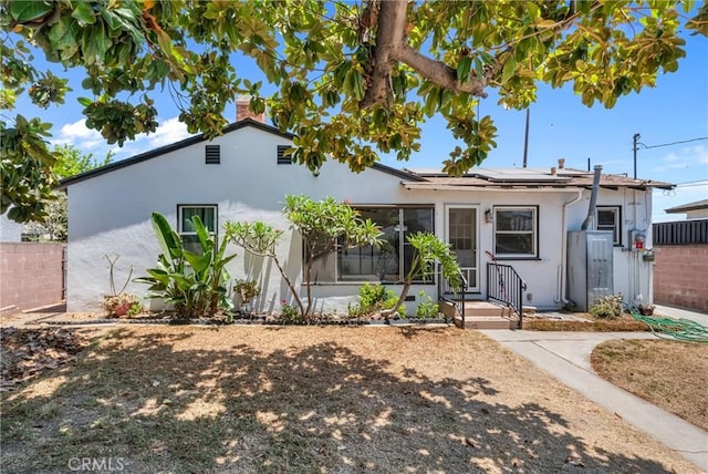 7503 Norwalk Blvd, Whittier, CA 90606 - bungalow-style home featuring stucco siding and solar panels