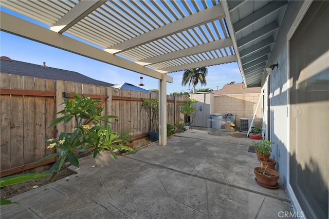 1076 Mitchell Ave, Tustin, CA 92780 - fenced backyard featuring a patio area and a shed