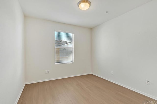1131 Elfin Forest Rd E, San Marcos, CA 92078 - unfurnished room featuring wood finished floors and baseboards