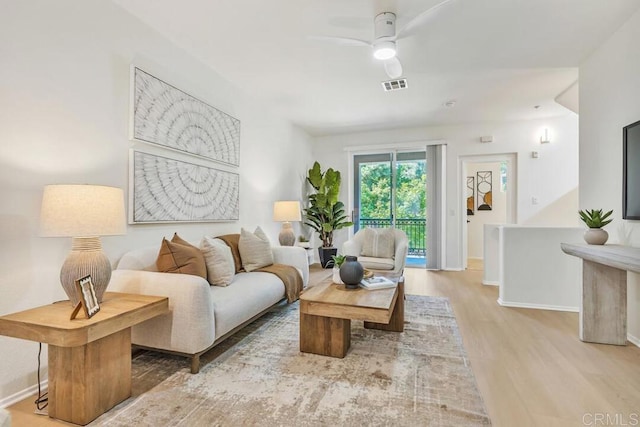 1131 Elfin Forest Rd E, San Marcos, CA 92078 - living room with wood finished floors and a ceiling fan