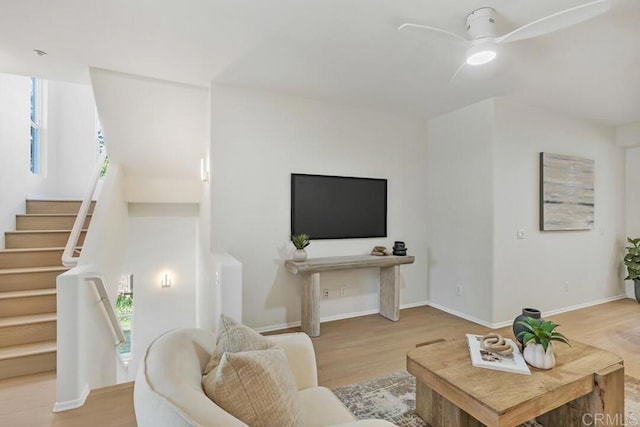 1131 Elfin Forest Rd E, San Marcos, CA 92078 - living area featuring wood finished floors, stairway, and ceiling fan