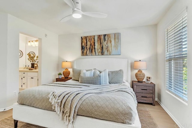 1131 Elfin Forest Rd E, San Marcos, CA 92078 - bedroom featuring multiple windows, ensuite bath, wood finished floors, and ceiling fan