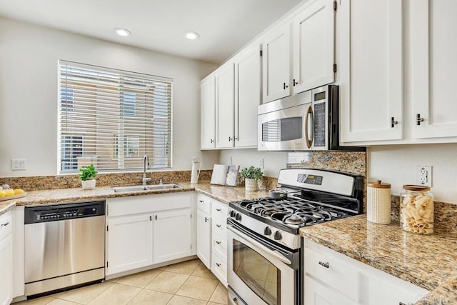1131 Elfin Forest Rd E, San Marcos, CA 92078 - kitchen featuring stainless steel appliances, white cabinetry, light stone counters, and recessed lighting