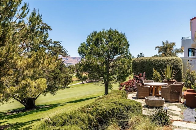 769 Greystone Pl, San Luis Obispo, CA 93401 - view of home's community with a lawn, a patio, and golf course view