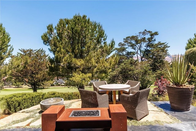 769 Greystone Pl, San Luis Obispo, CA 93401 - view of patio with an outdoor fire pit and outdoor dining space