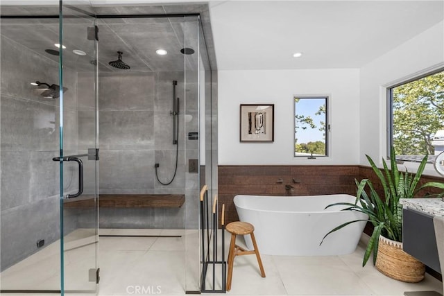 769 Greystone Pl, San Luis Obispo, CA 93401 - bathroom featuring a freestanding bath, a shower stall, wainscoting, tile patterned flooring, and vanity