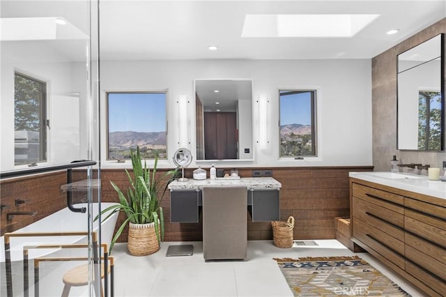 769 Greystone Pl, San Luis Obispo, CA 93401 - full bath with vanity, a skylight, plenty of natural light, and recessed lighting