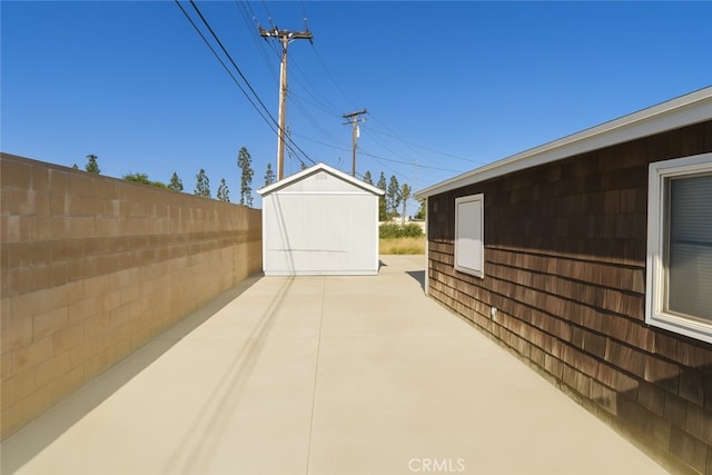 13132 Stanrich Pl, Garden Grove, CA 92843 - view of patio / terrace featuring a shed