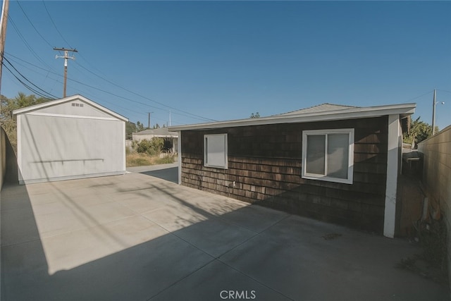 13132 Stanrich Pl, Garden Grove, CA 92843 - view of property exterior featuring a patio and an outbuilding