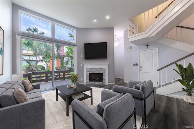 9000 Vanalden Ave Unit 176, Northridge, CA 91324 - living area with stairway, light wood finished floors, a fireplace, and recessed lighting